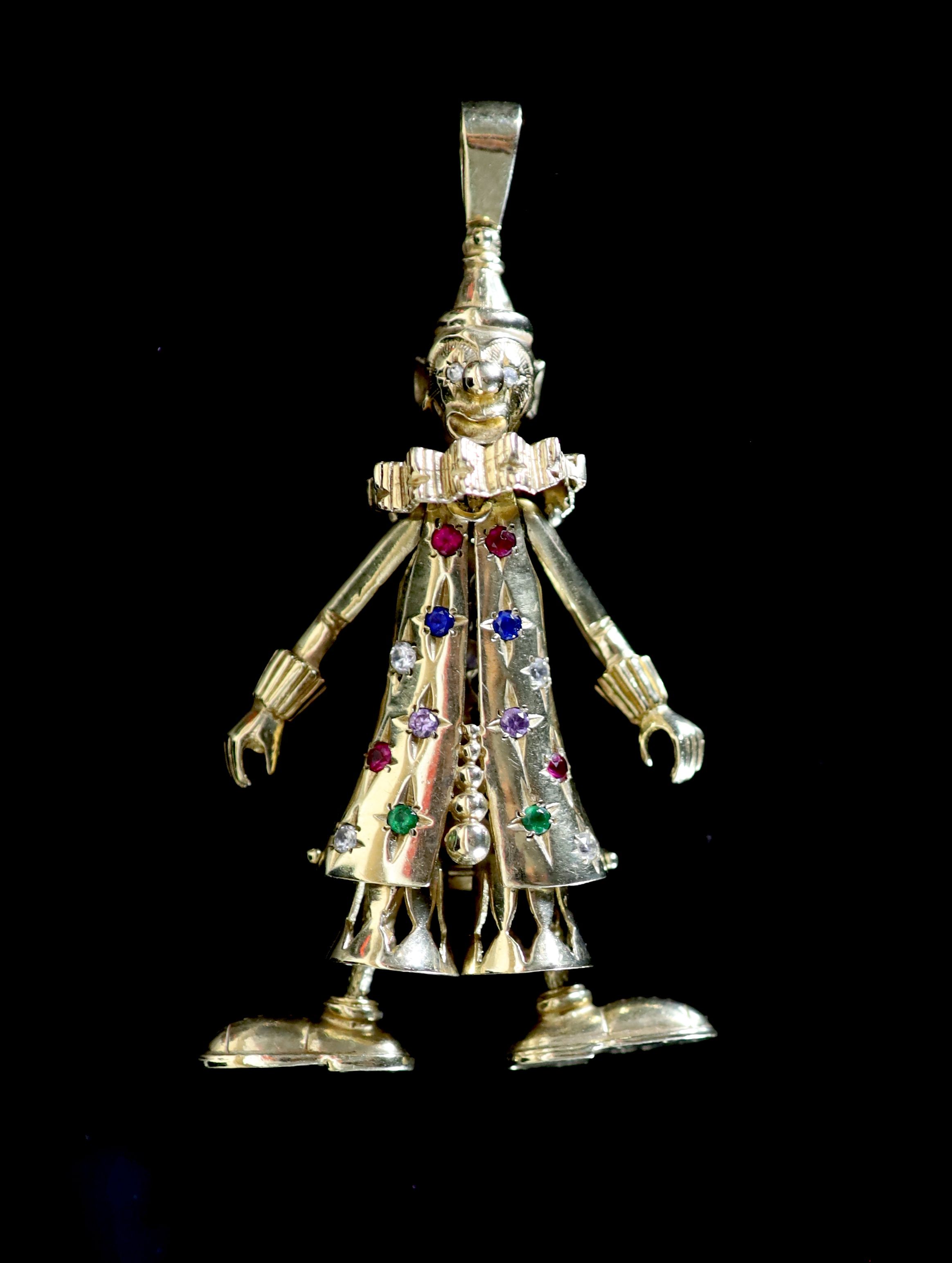 A modern 9ct gold and gem set articulated pendant, modelled as a clown